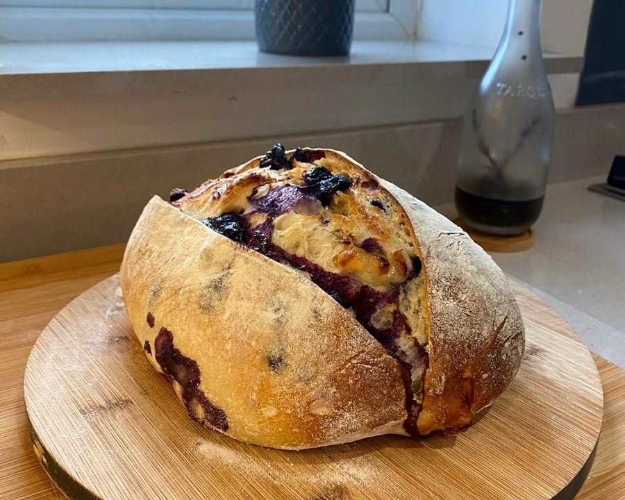 Fresh artisan loaf on a wooden board