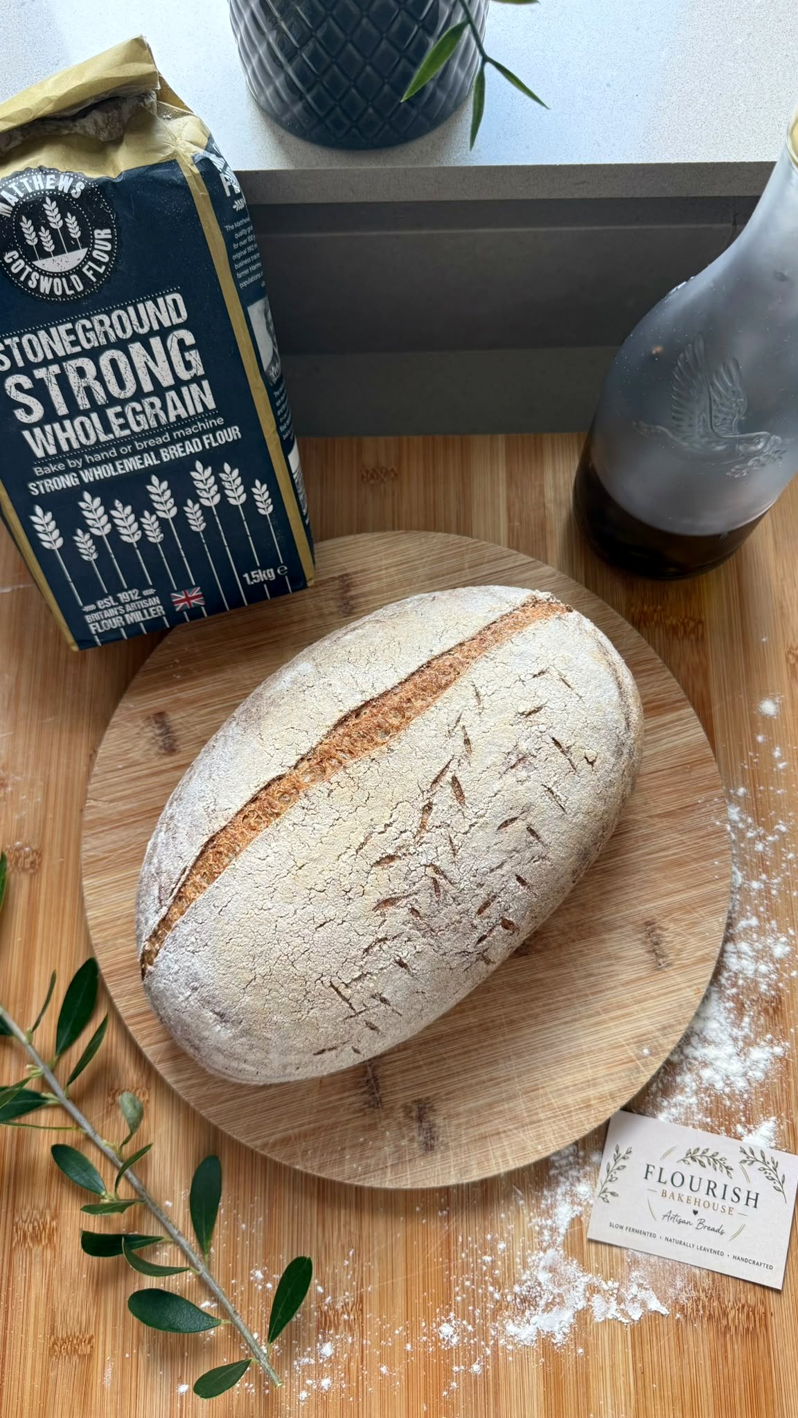 Wholemeal sourdough loaf on a wooden board